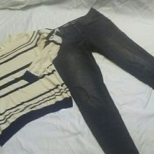 Black jeans and a quicksilver thin sweater